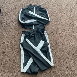 Black and white two piece track set .